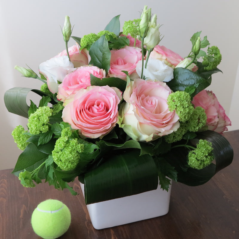 Flowers used: pink roses, green viburnums, white lisianthus