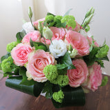 Flowers used: pink roses, green viburnums, white lisianthus