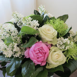 Flowers used: white lilacs, green chrysanthemums, white roses and pink peonies