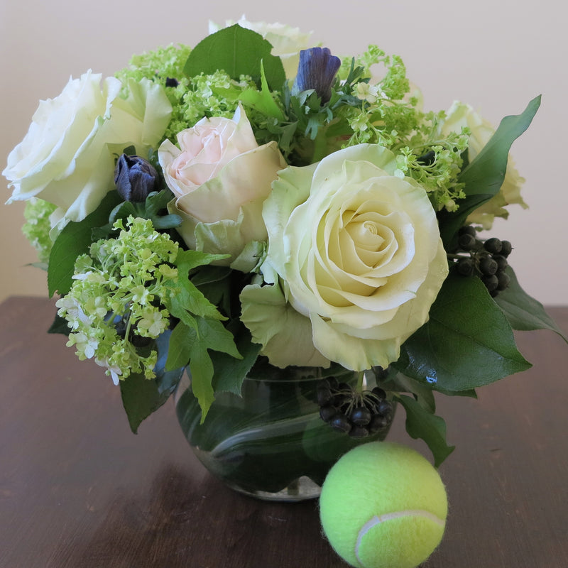 Flowers used: white and pink roses, green viburnums, blue anemones