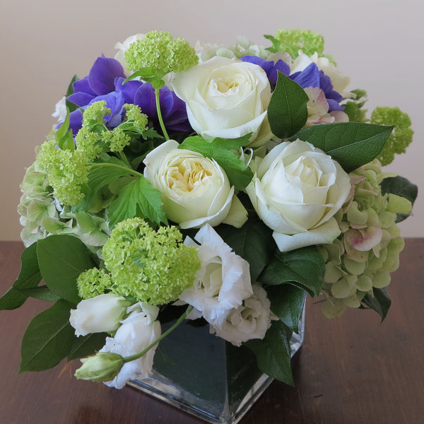 Flowers used: cream white roses, blue anemones, green hydrangeas, green viburnum, white lisianthus